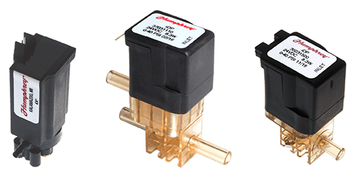 Three Humphrey MVS series solenoid valves shown side by side, ranging from compact black body to brass-ported versions for diagnostic devices.