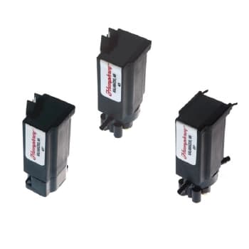 Three Humphrey IDP series inert solenoid valves, black compact body with bottom port fittings, shown in a group arrangement.