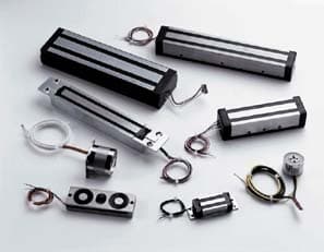 Assorted electromagnets and solenoid coils in various sizes with wire leads, from South Haven Coil product line